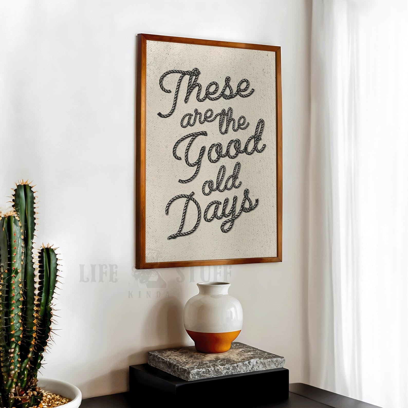 Modern western wall featuring the "These Are The Good Old Days" sign in a rustic wood frame.