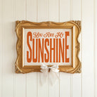 You Are My Sunshine art print in retro typography on natural matte paper, styled as nursery wall art or kids playroom decor